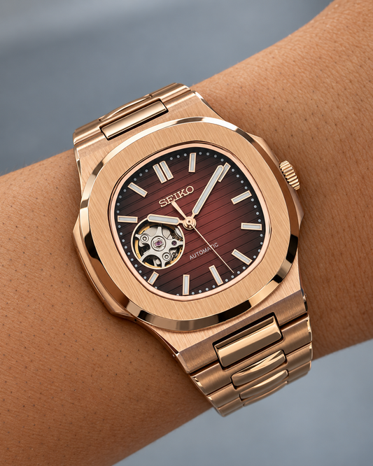 Nautilus Rose Gold en la muñeca, con esfera chocolate, apertura Open Heart y brazalete de tono oro rosa